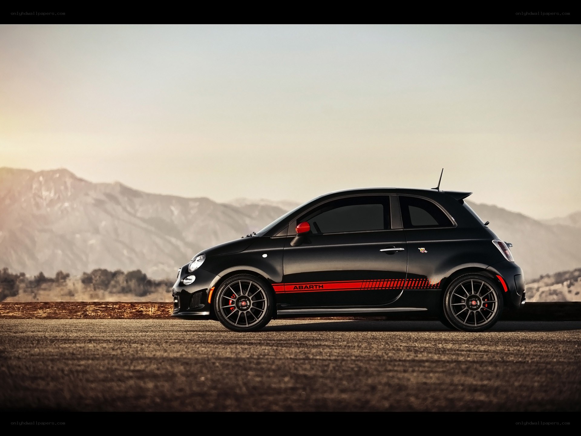 Black Abarth car on road
