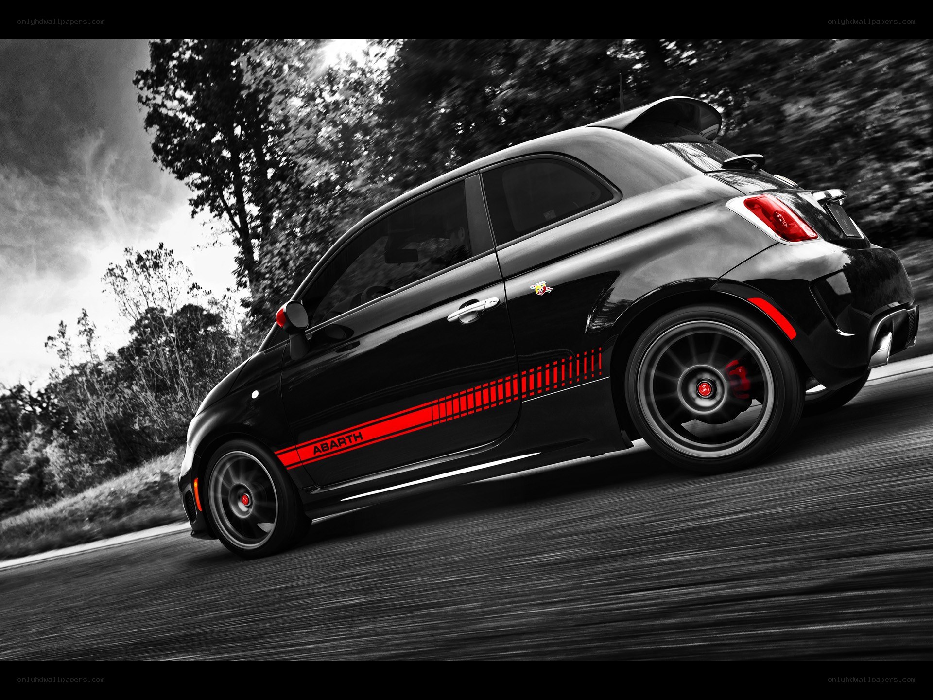 Black Abarth car on road