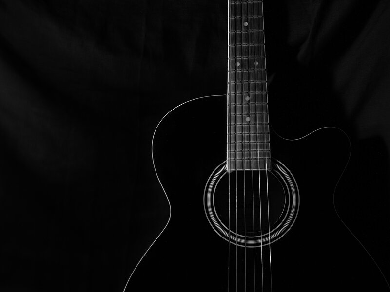 Black Acoustic Guitar — Dramatic