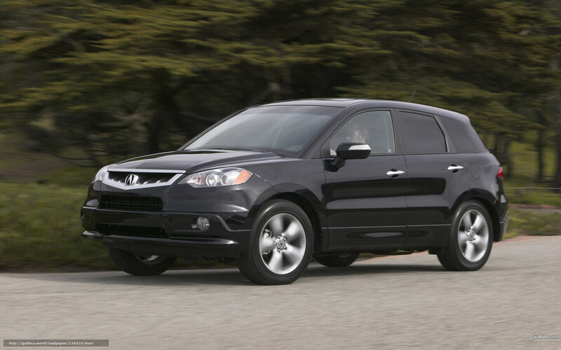 Black Acura RDX in motion