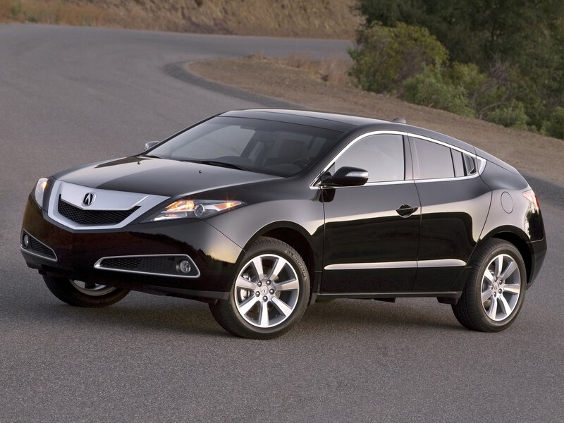 Black Acura RDX on road
