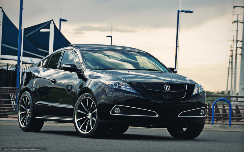 Black Acura RDX parked on street