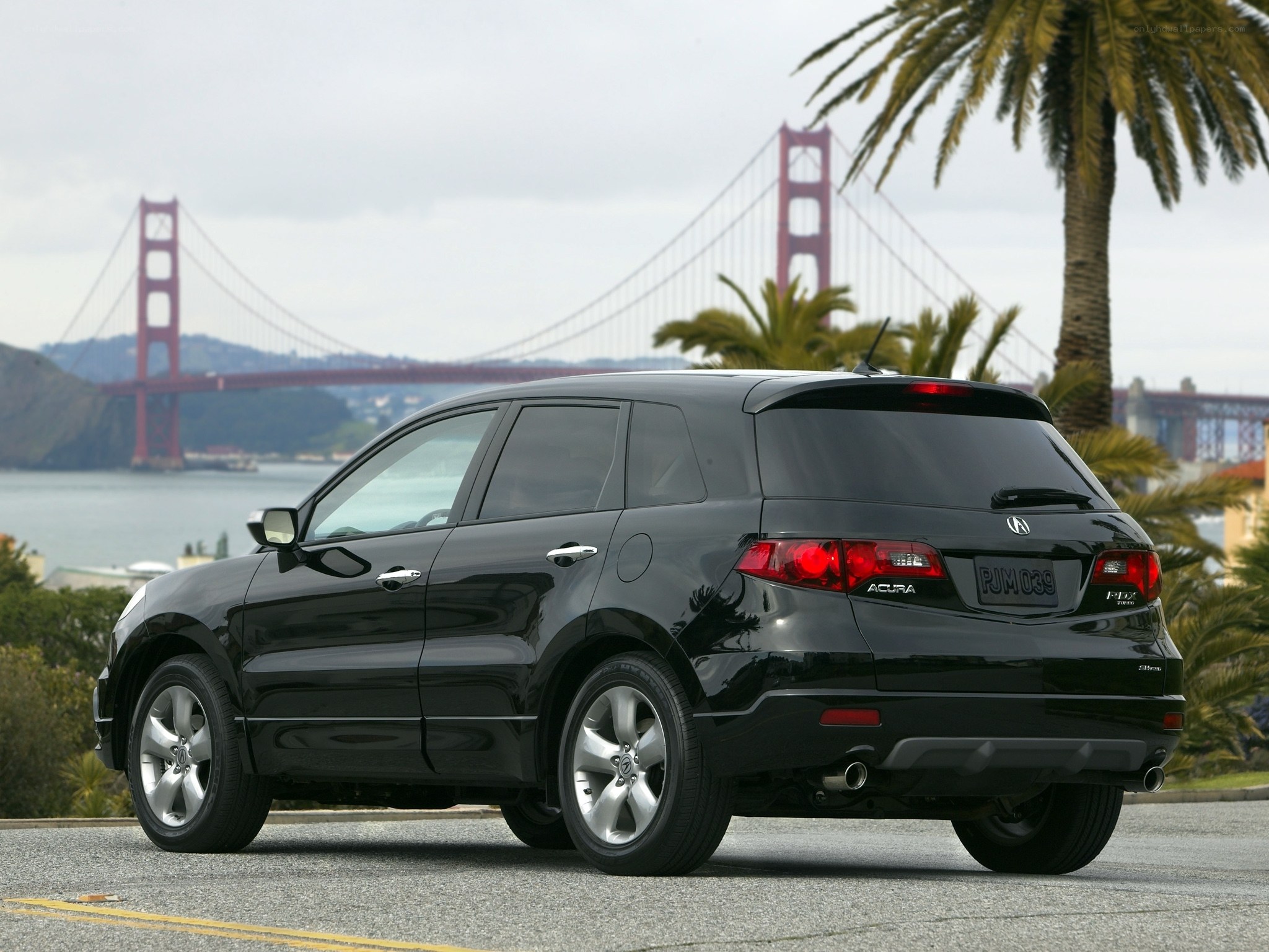 Black Acura RDX with Golden Gate Bridge