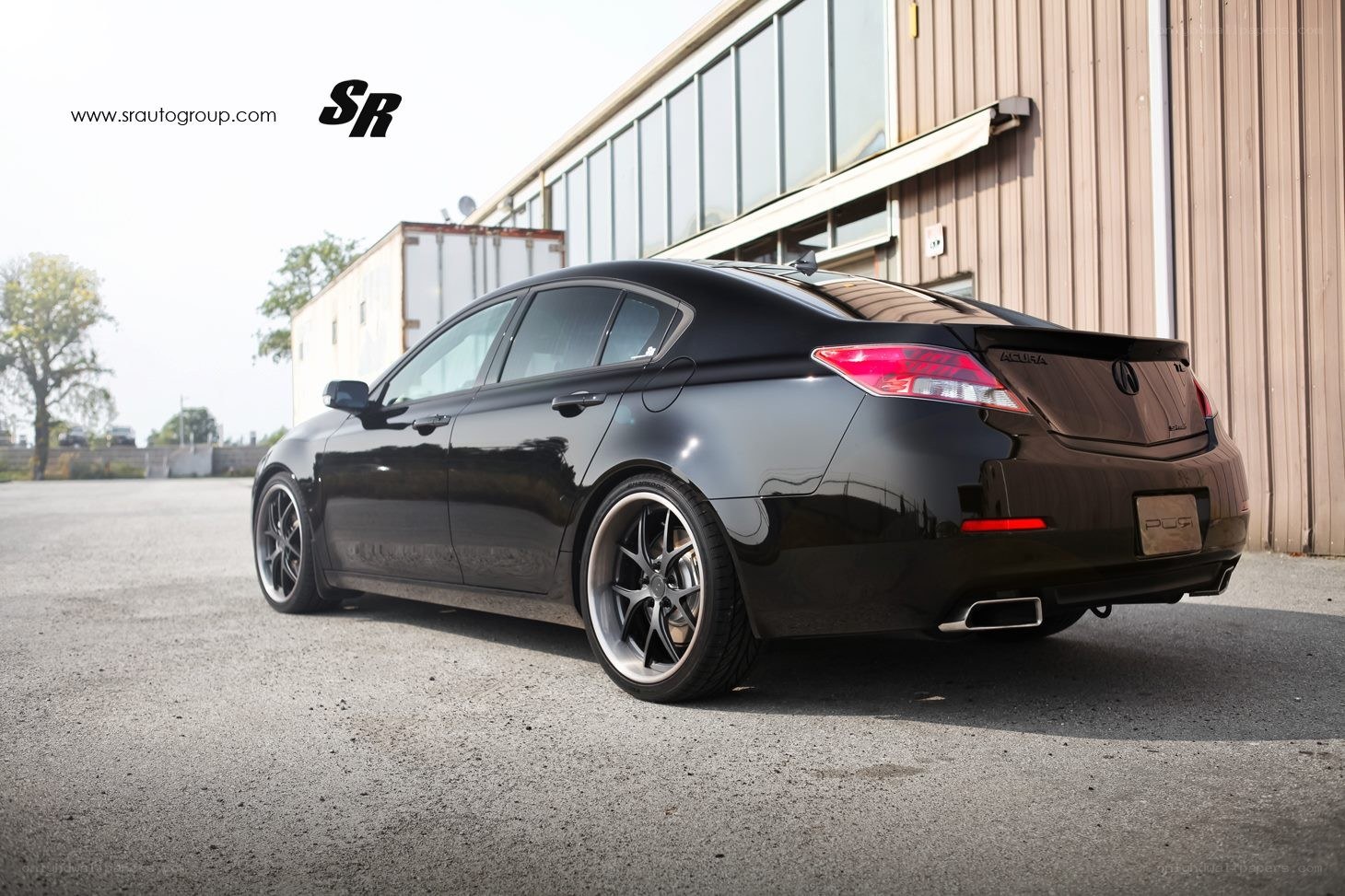 Black Acura TL with custom wheels