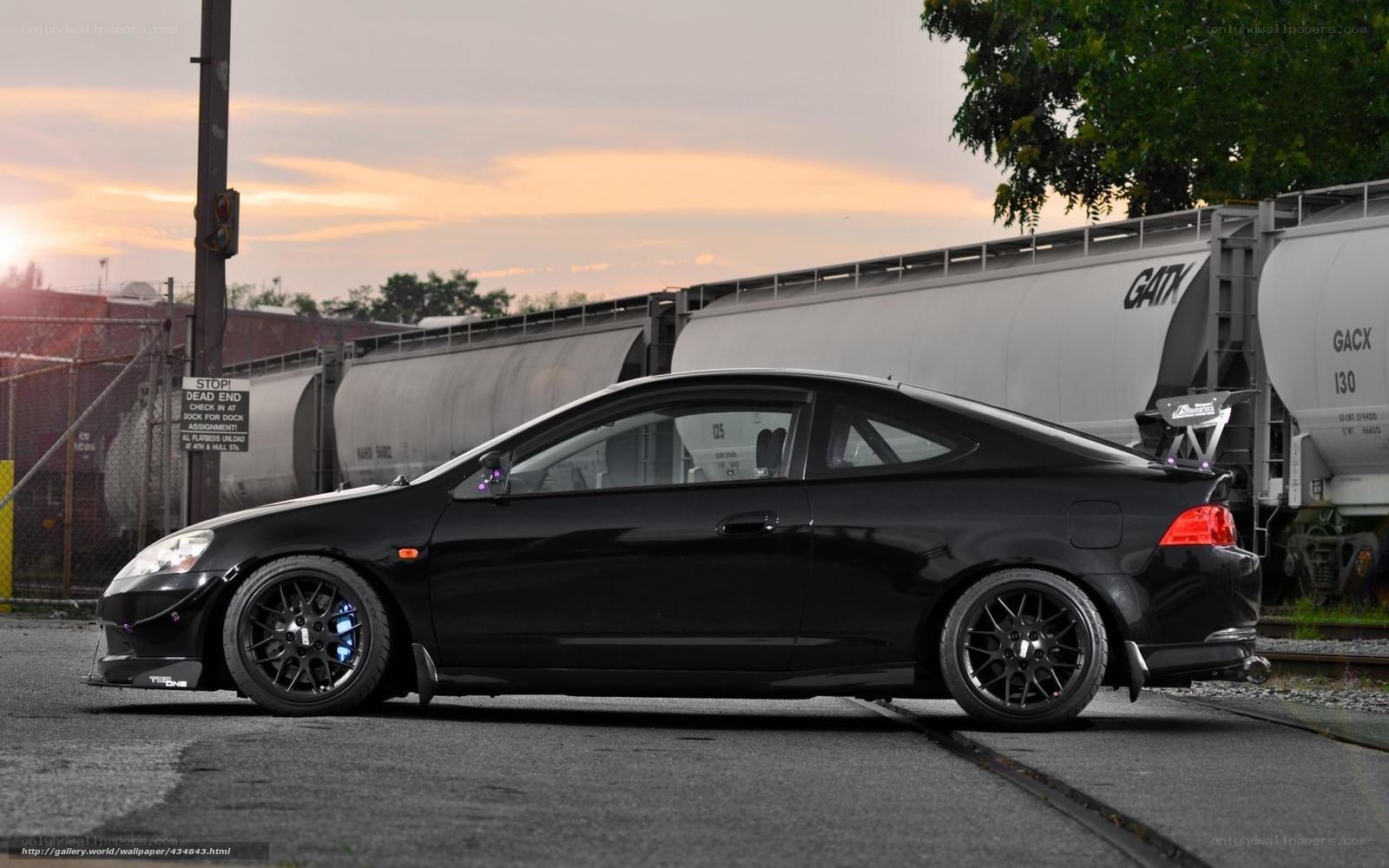 black acura type s at sunset