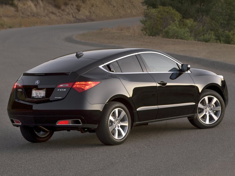 Black Acura ZDX on winding road