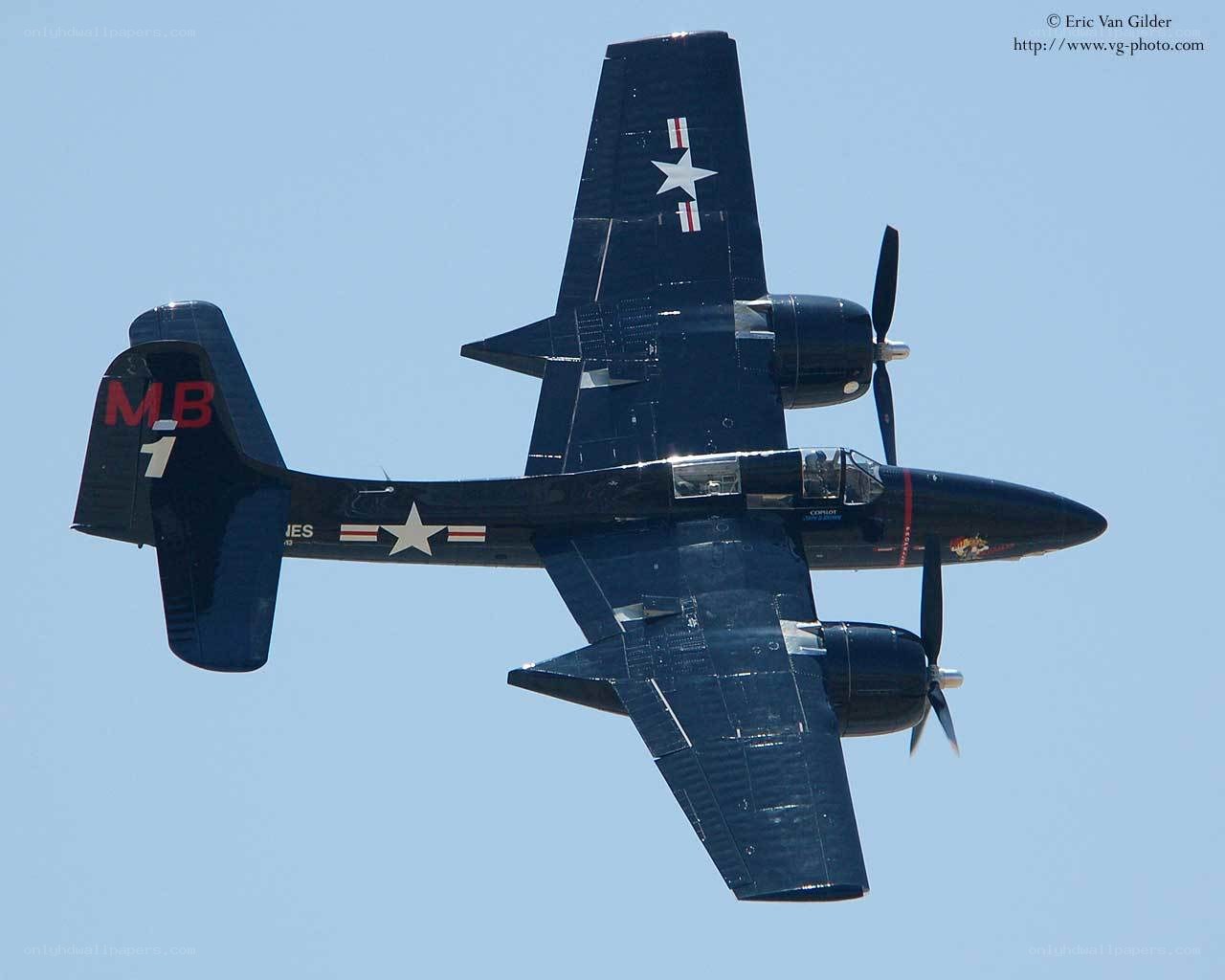 Black aircraft in flight