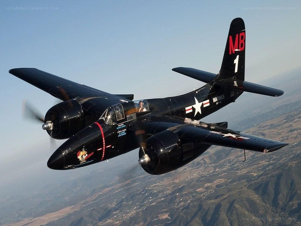Black aircraft in flight