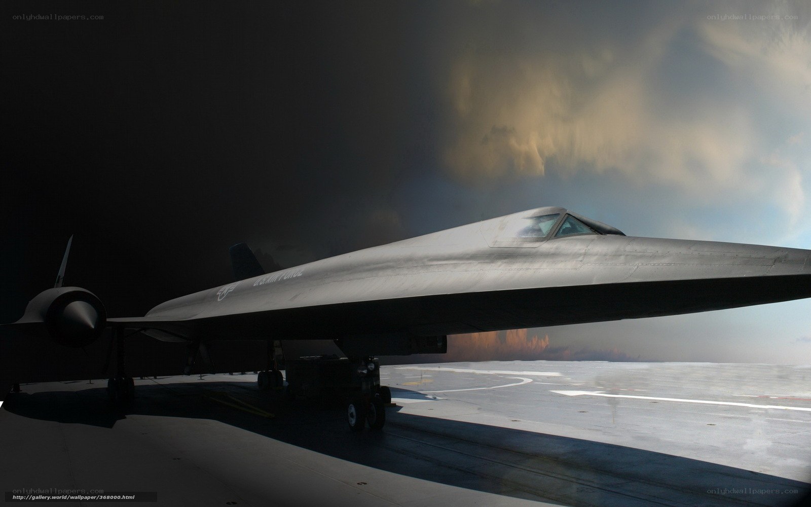 Black aircraft on tarmac