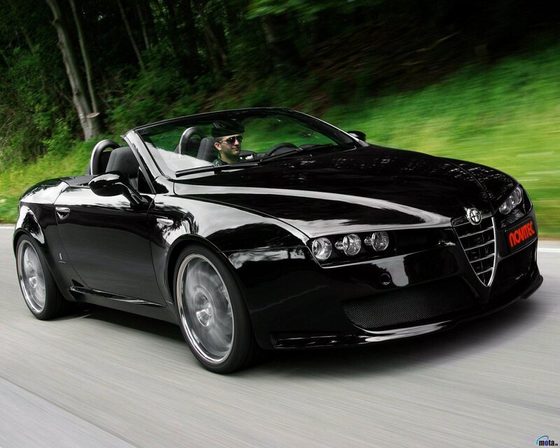 Black Alfa Romeo convertible in motion