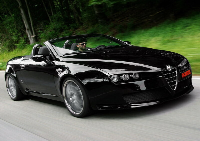Black Alfa Romeo convertible in motion