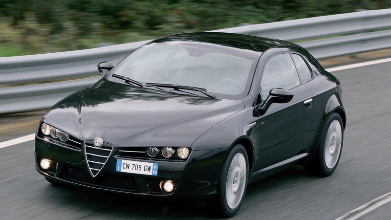 black alfa Romeo driving on road