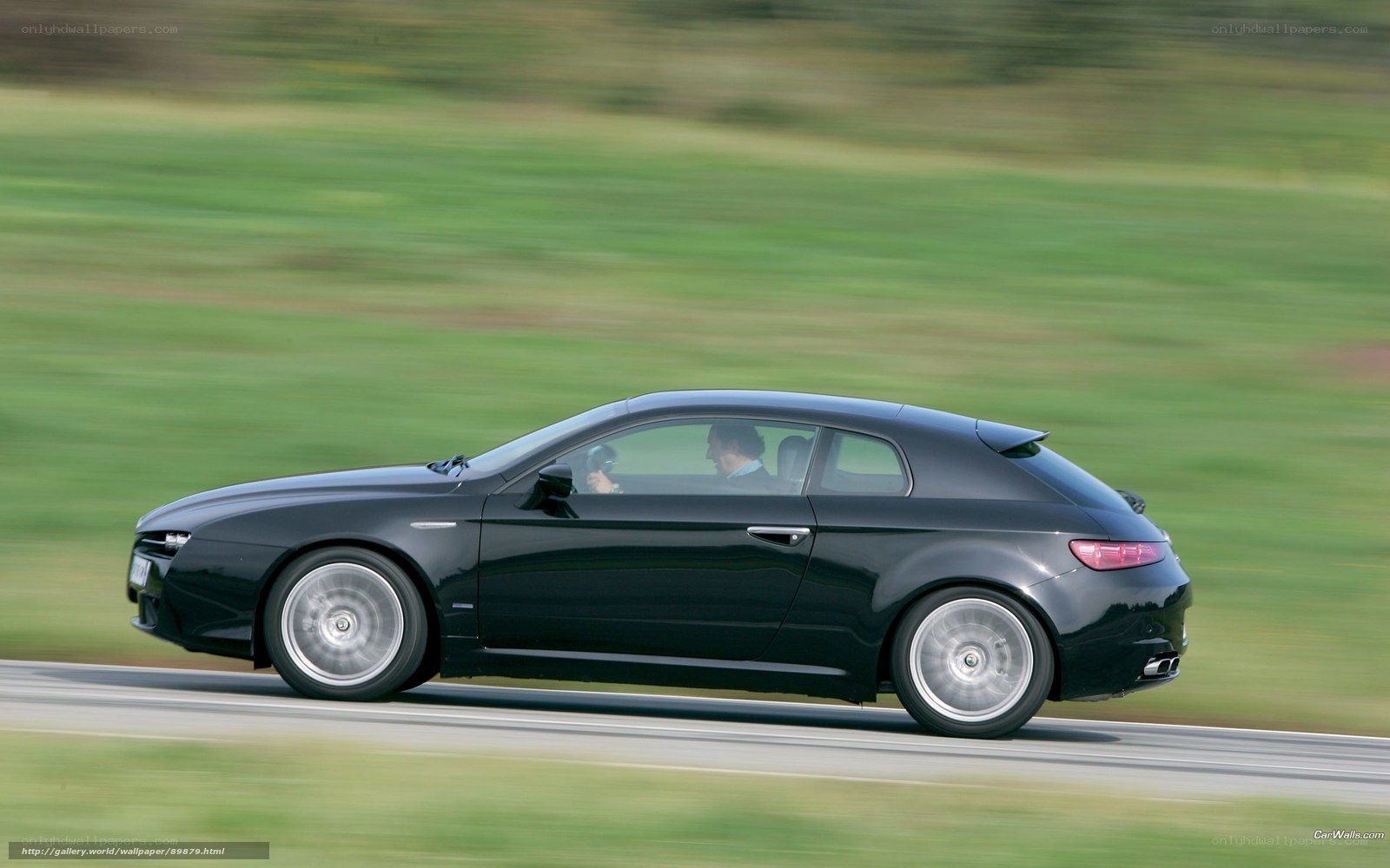 black alfa romeo in motion