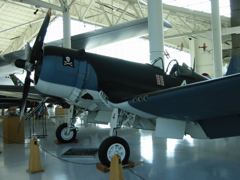 Black and blue fighter plane on display