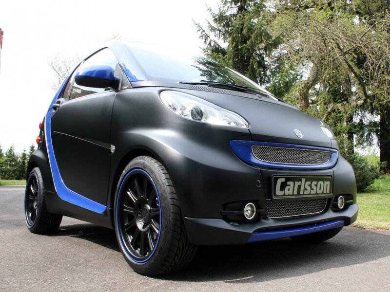 Black and blue smart car