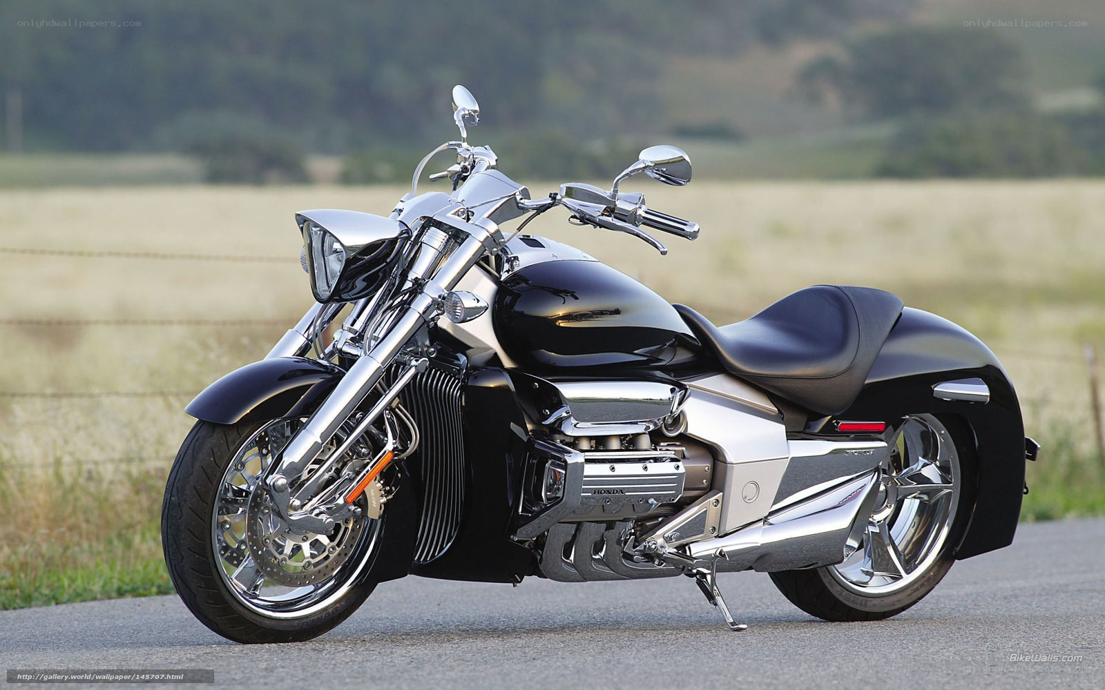 Black and chrome motorcycle on road