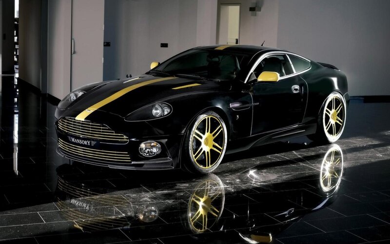 Black and gold Aston Martin
