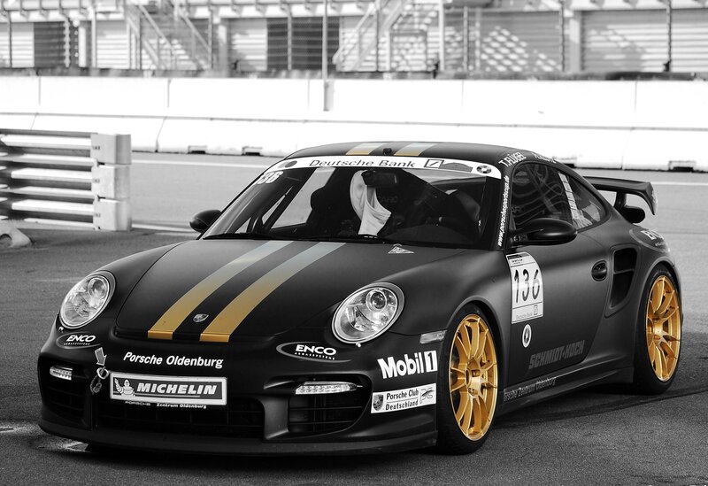Black and gold Porsche race car