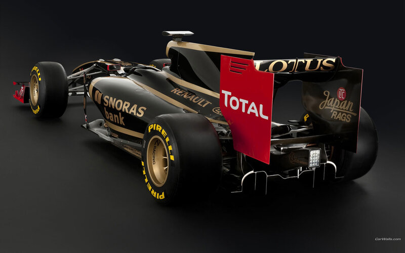 Black and Gold Race Car — Dramatic, Photograph, Pirelli Tires, Total Logo