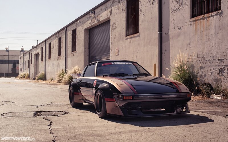 Black and Gold Sports Car — Dramatic, Afternoon, Photograph