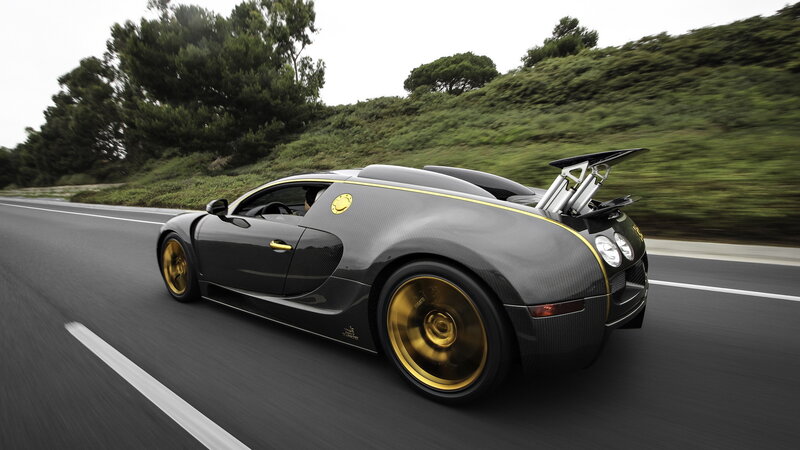 Black and Gold Sports Car — Dynamic