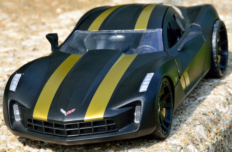 Black and Gold Toy Car — Neutral, Afternoon, Photograph, Stripes