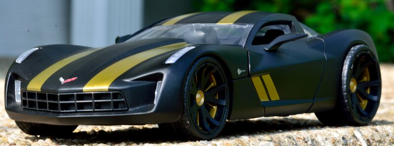 Black and Gold Toy Car — Neutral, Afternoon, Photograph