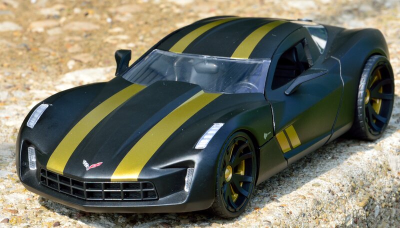 Black and Gold Toy Car — Neutral, Afternoon