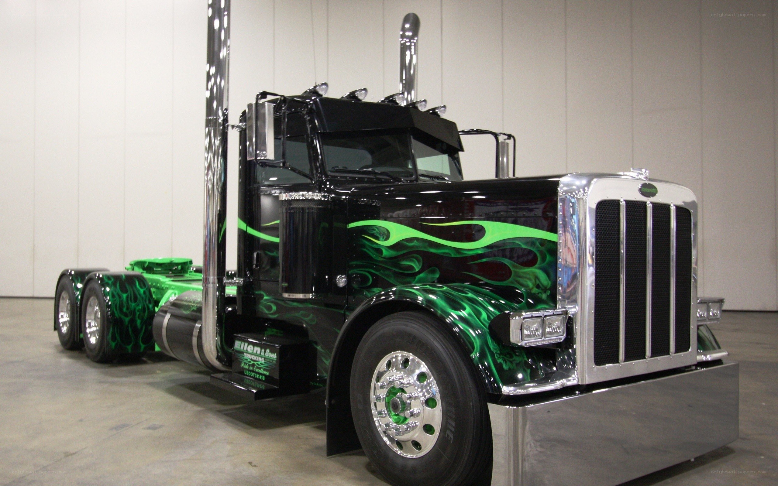 black and green flame truck