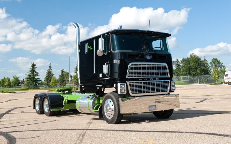 black and green semi-truck