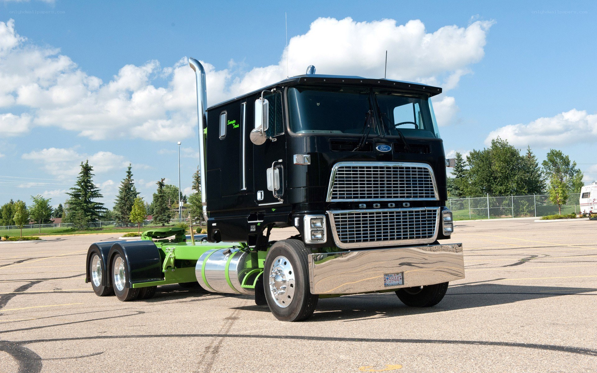 black and green semi-truck