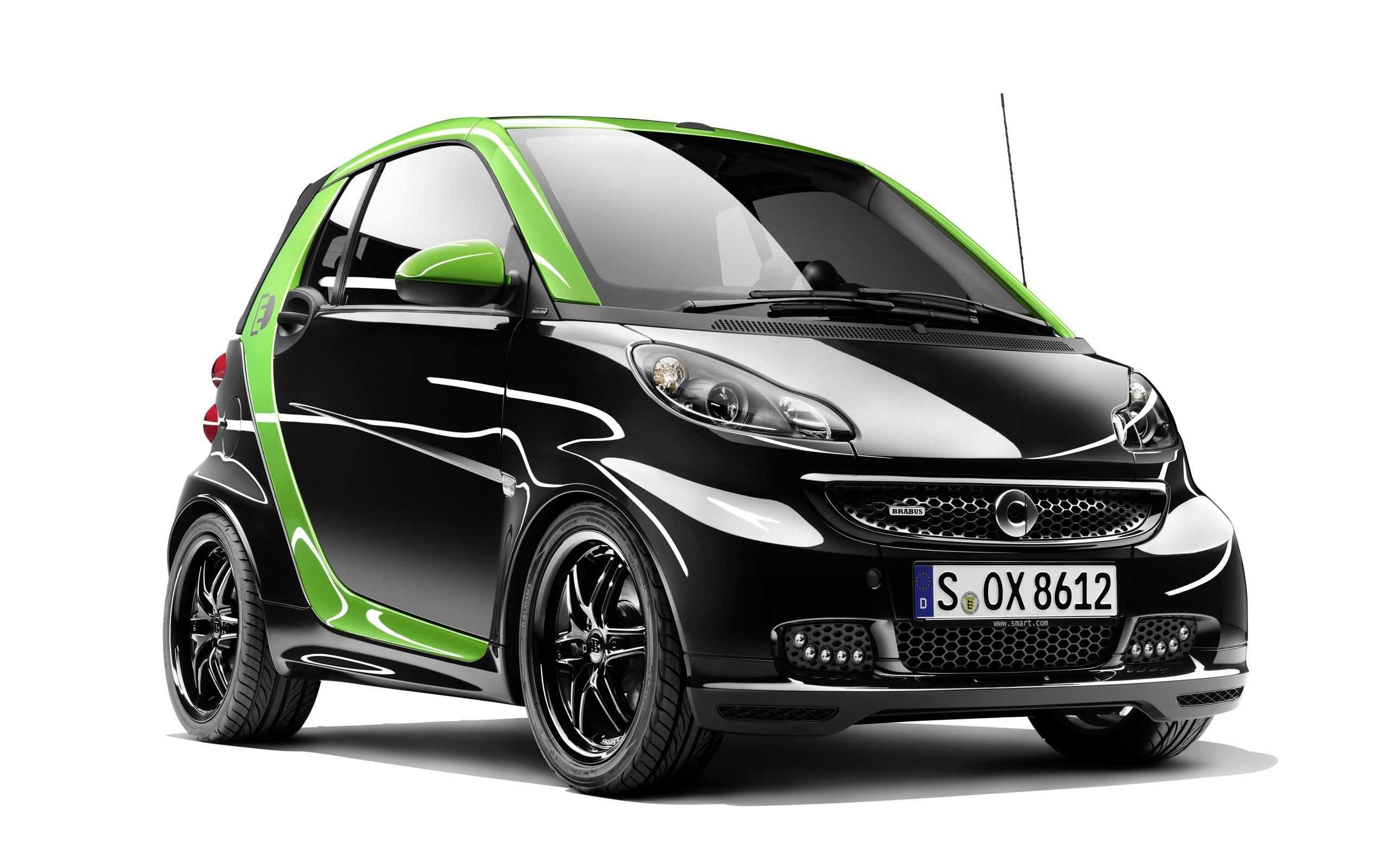 black and green smart car
