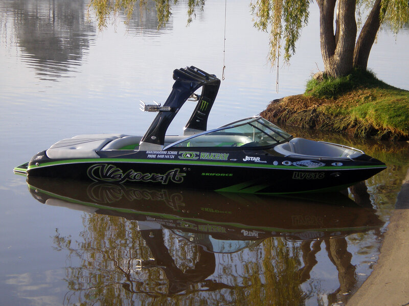 Black and Green Wakeboard Boat