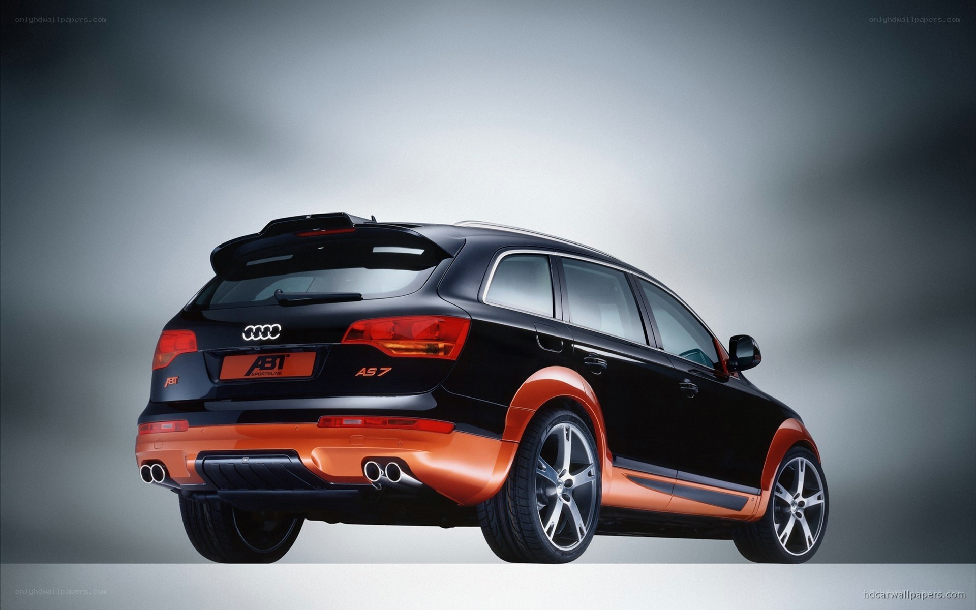 black and orange audi suv