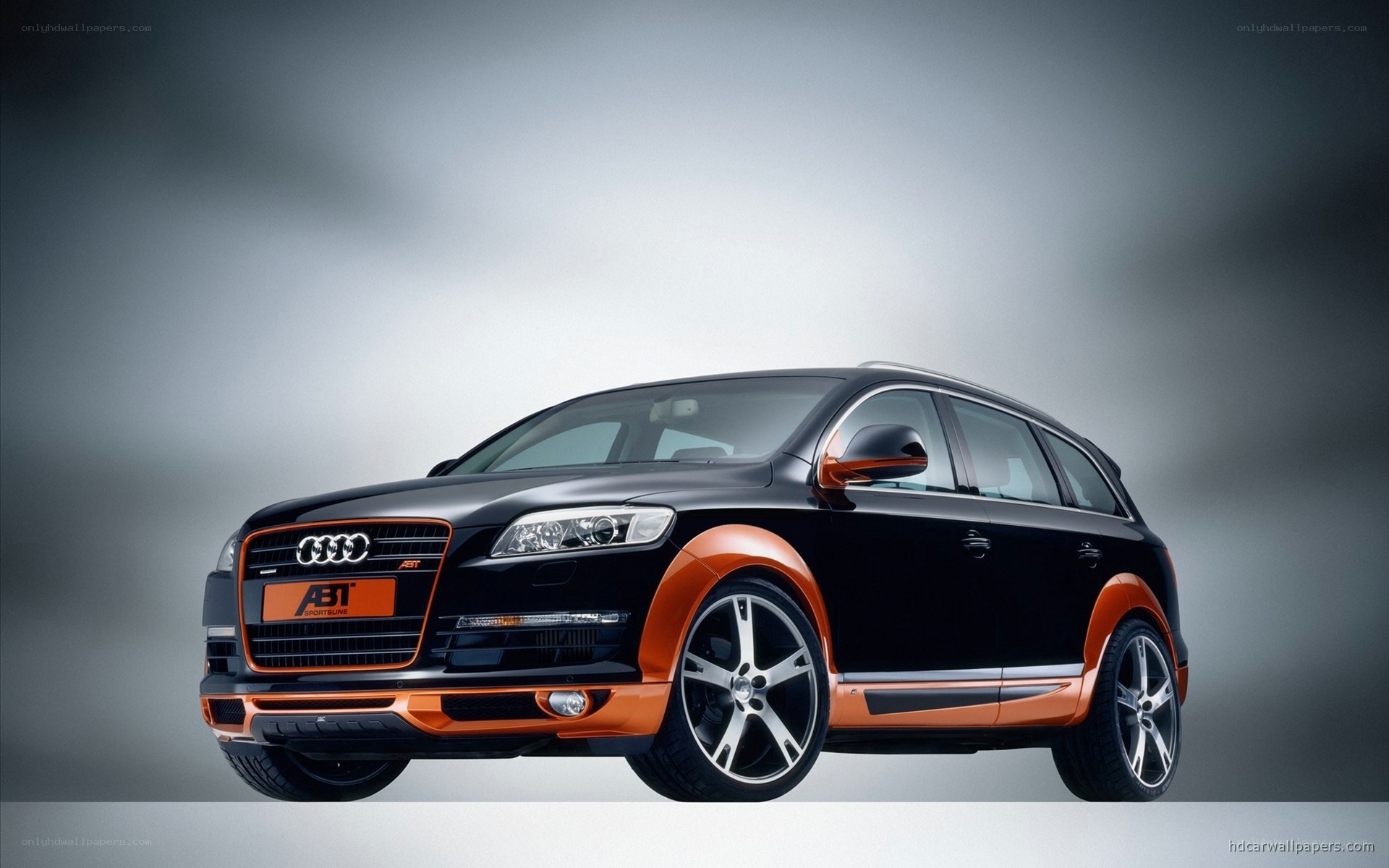 black and orange audi suv