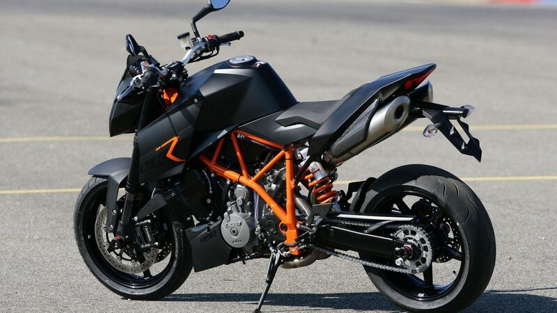 black and orange motorcycle