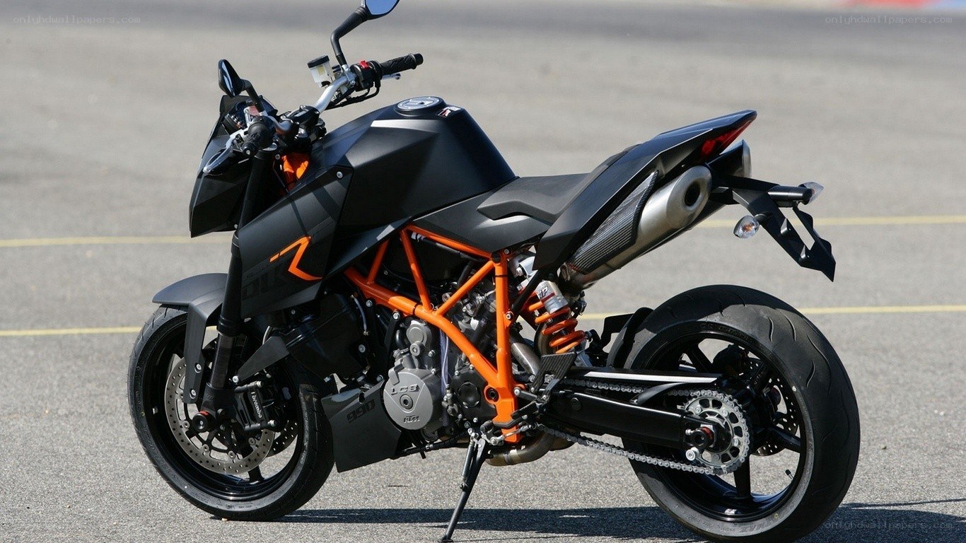 black and orange motorcycle