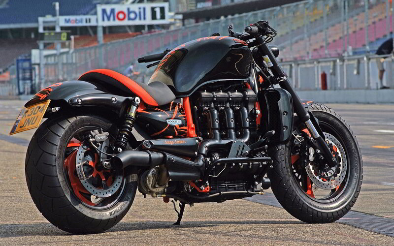 Black and Orange Motorcycle — Dramatic, Afternoon, Photograph, Race Track