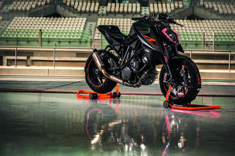 Black and Orange Motorcycle — Dramatic, Photograph, Stadium Seats