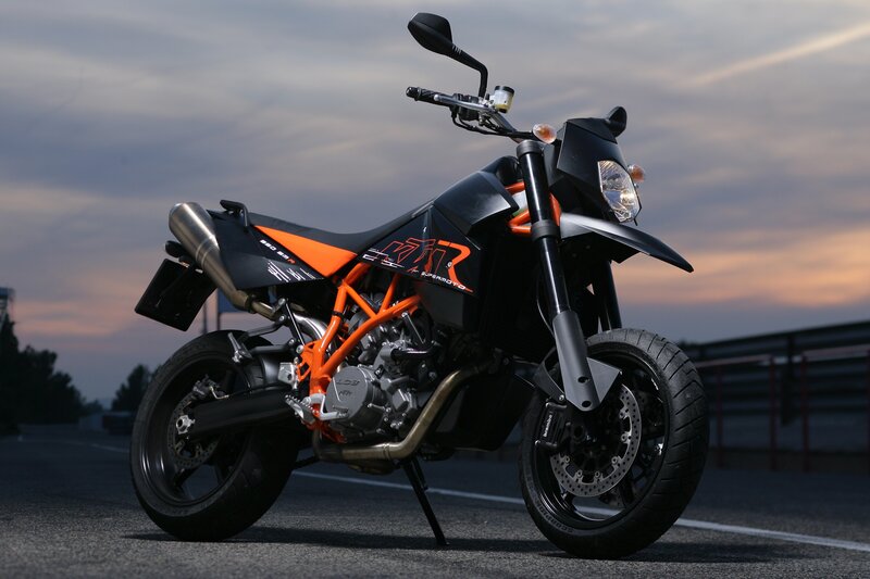 Black and Orange Motorcycle — Dramatic, Sunset, Photograph, Road