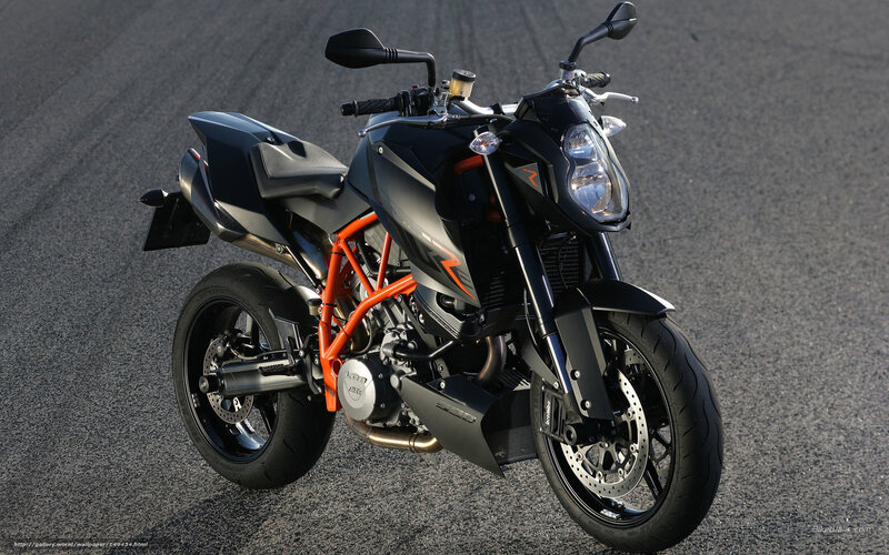 black and orange motorcycle