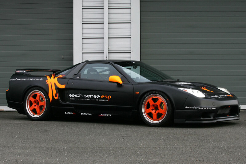 Black and orange race car