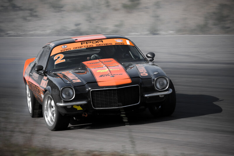 Black and Orange Race Car — Dynamic