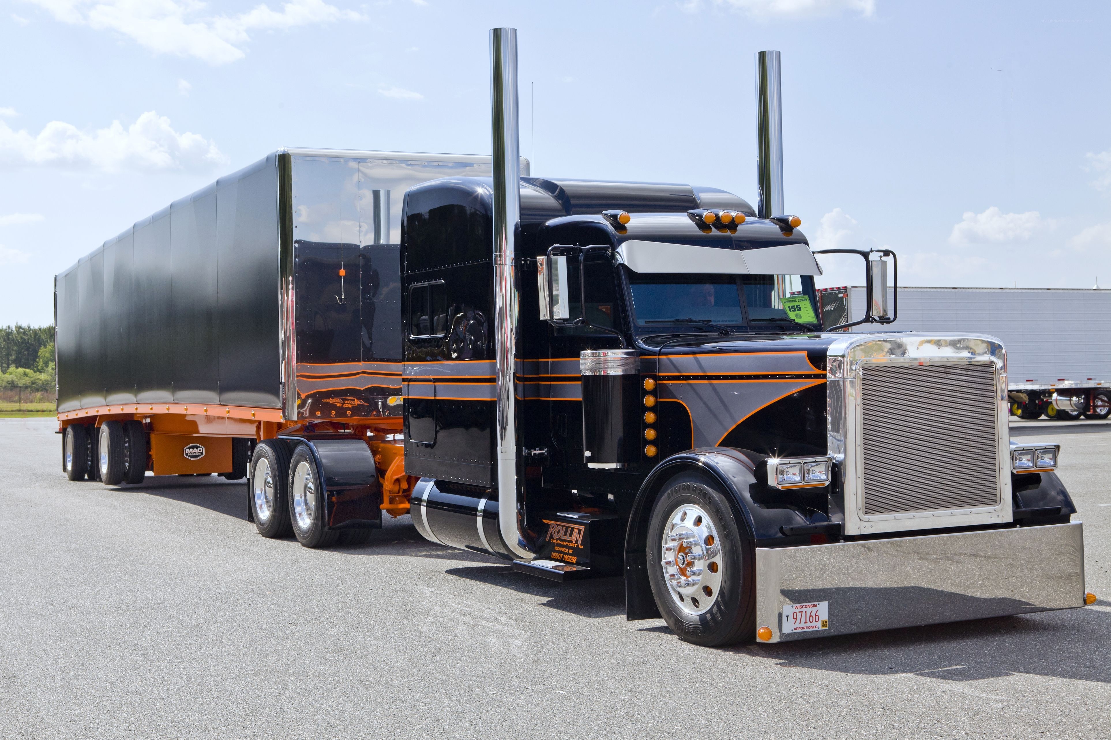 black and orange semi-truck
