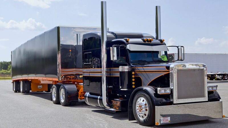 black and orange semi-truck