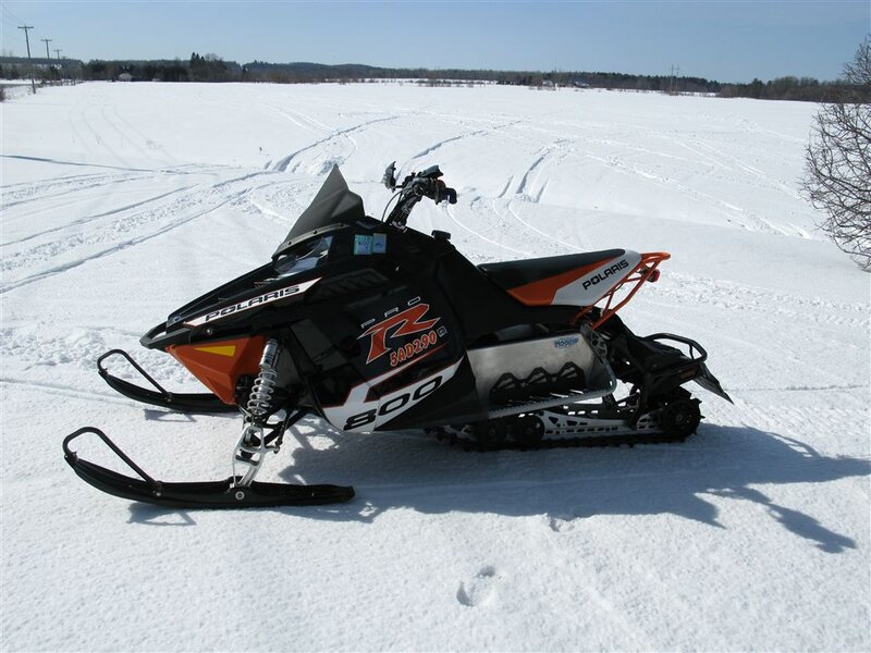 Black and Orange Snowmobile