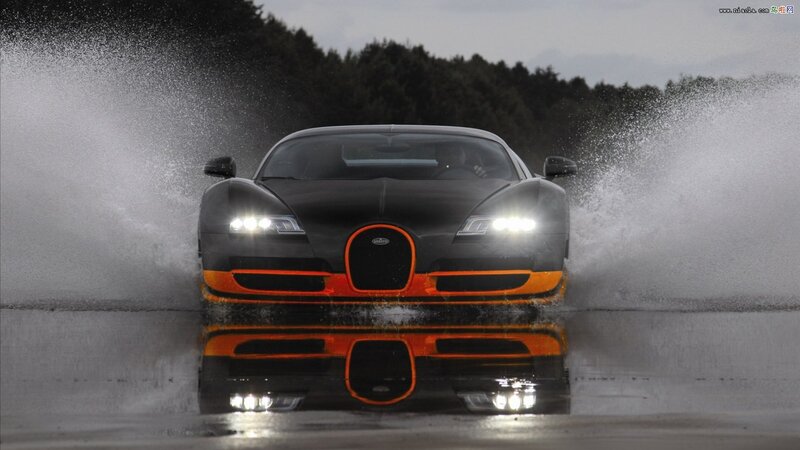 Black and Orange Sports Car — Dramatic, Photograph, Water Spray
