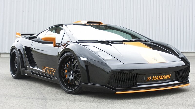Black and Orange Sports Car — Dynamic, Photograph, Tire, Wing