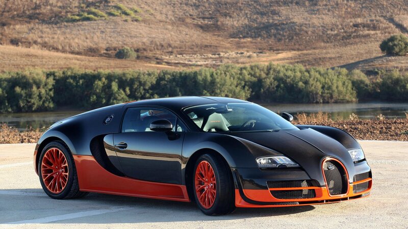 Black and Orange Sports Car — Serene, Afternoon, Photograph