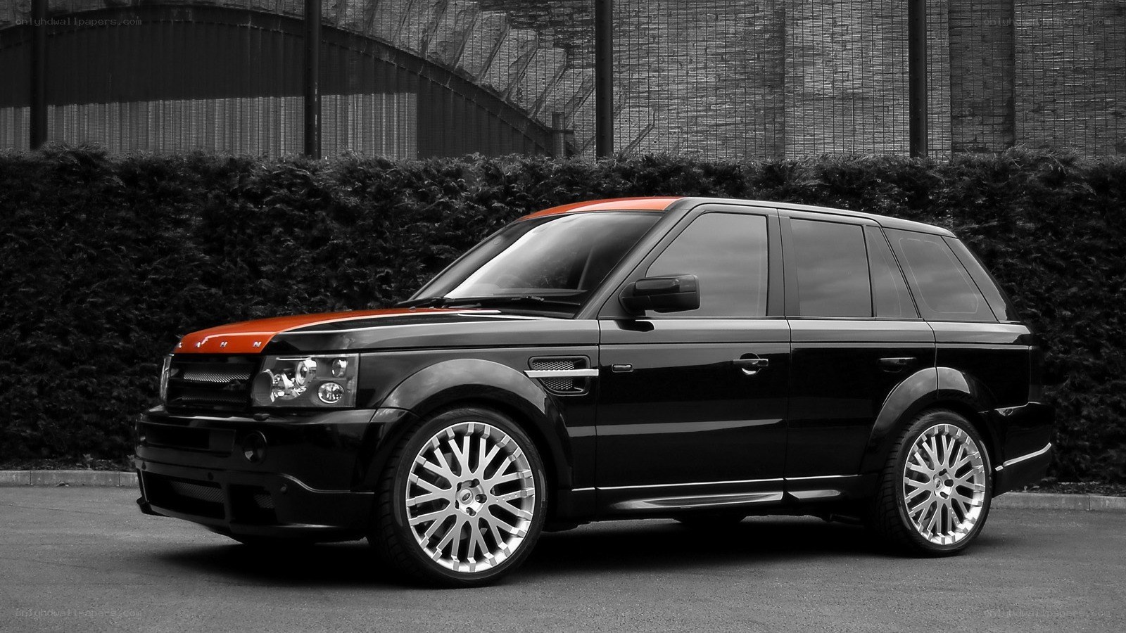 black and orange suv